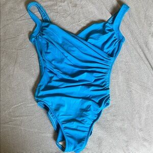 Miraclesuit One-Piece Swimsuit with Ruching for a Flattering Fit!